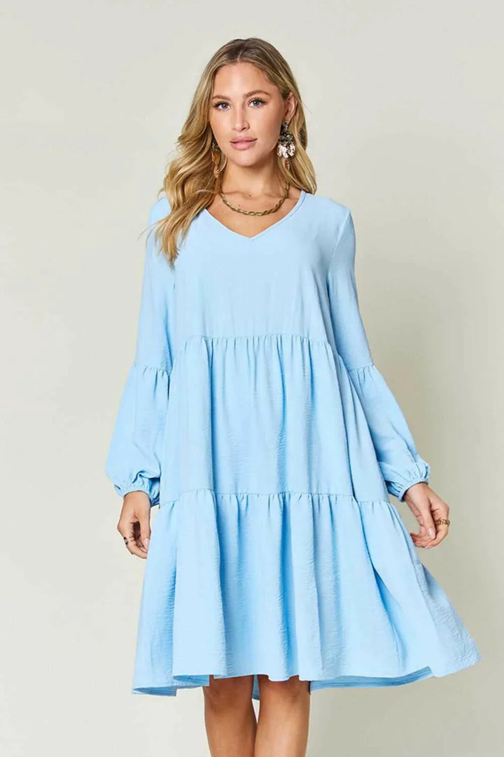 Effortless Elegance Tiered DressExclusivity statementDiscover the unmatched charm of the Effortless Elegance Tiered Dress, a chic mini dress designed exclusively for those who appreciate refined stMini DressesEffortless Elegance Tiered Dress