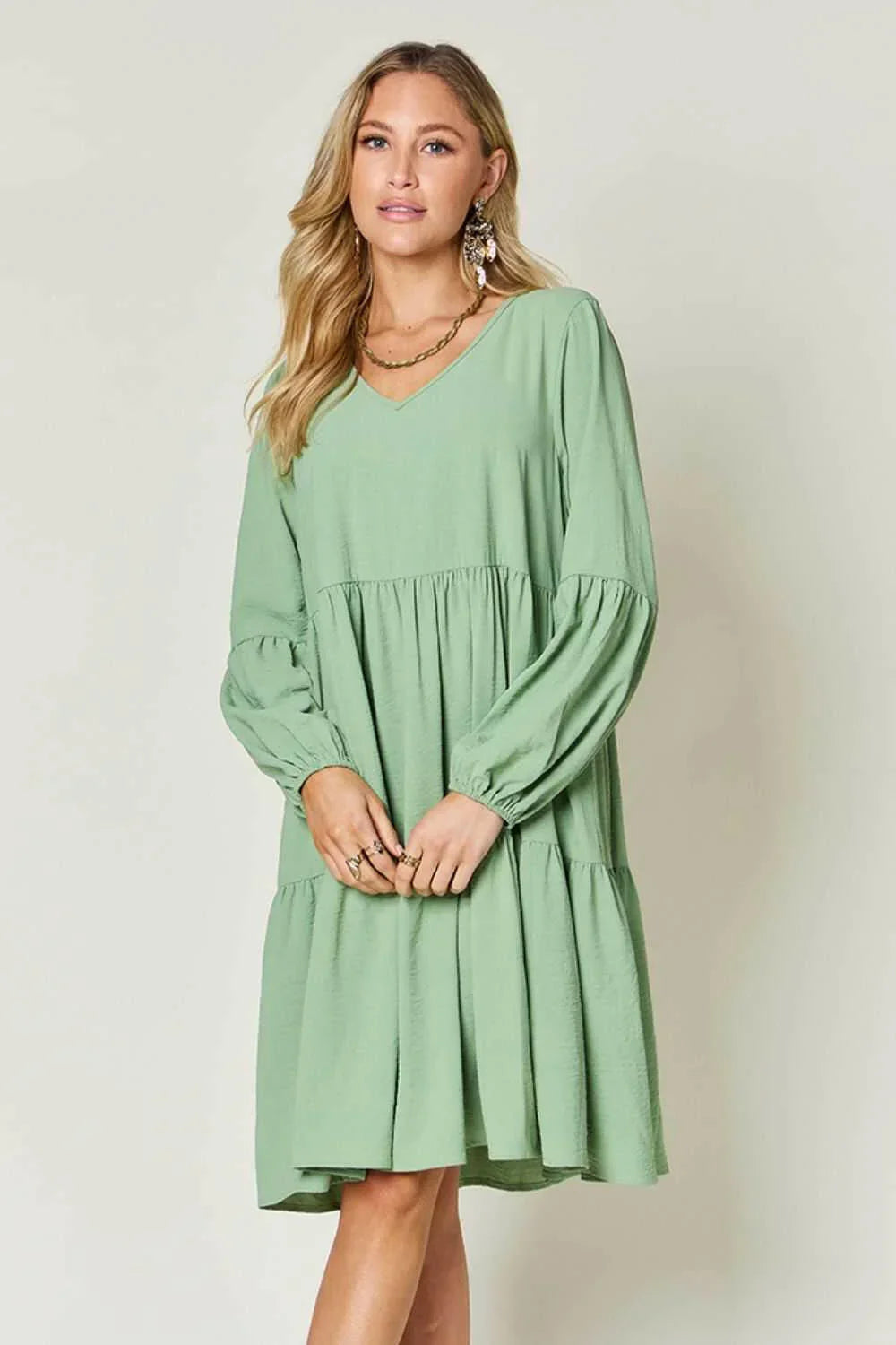 Effortless Elegance Tiered DressExclusivity statementDiscover the unmatched charm of the Effortless Elegance Tiered Dress, a chic mini dress designed exclusively for those who appreciate refined stMini DressesEffortless Elegance Tiered Dress