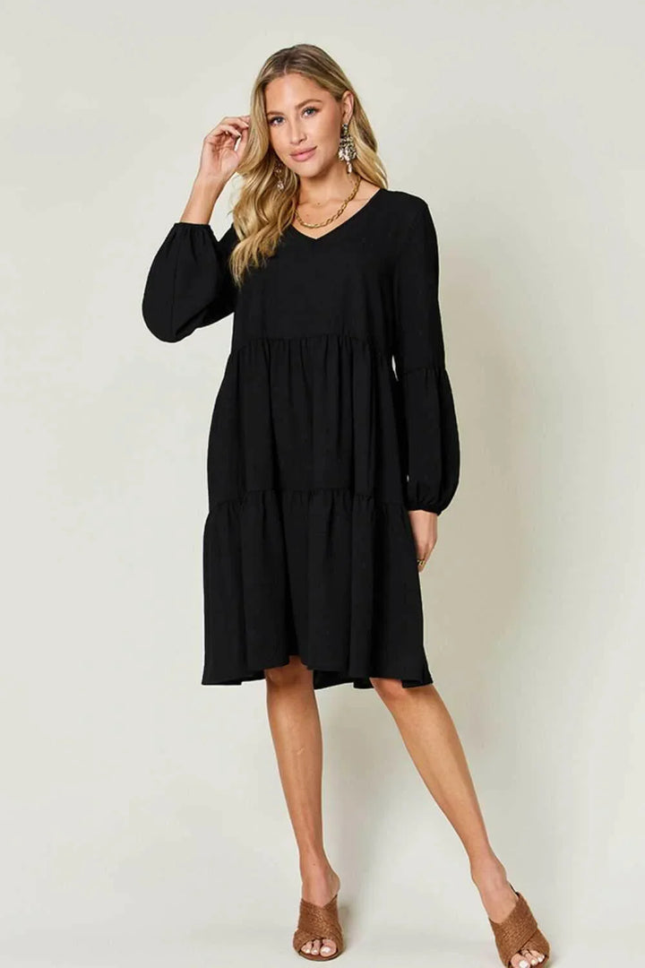 Effortless Elegance Tiered DressExclusivity statementDiscover the unmatched charm of the Effortless Elegance Tiered Dress, a chic mini dress designed exclusively for those who appreciate refined stMini DressesEffortless Elegance Tiered Dress