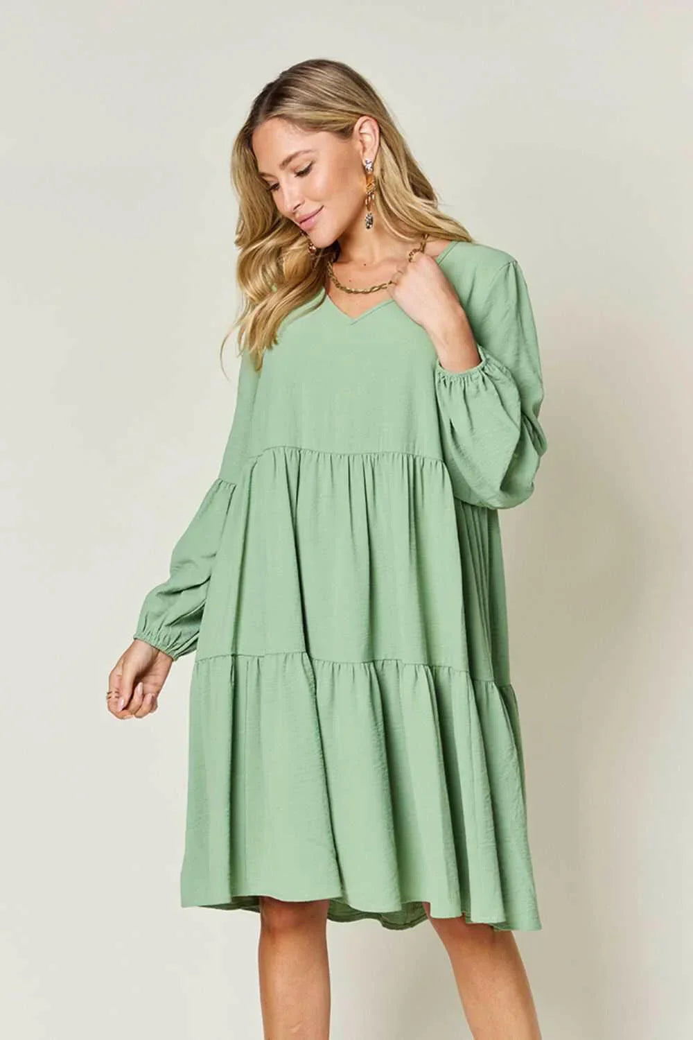 Effortless Elegance Tiered DressExclusivity statementDiscover the unmatched charm of the Effortless Elegance Tiered Dress, a chic mini dress designed exclusively for those who appreciate refined stMini DressesEffortless Elegance Tiered Dress