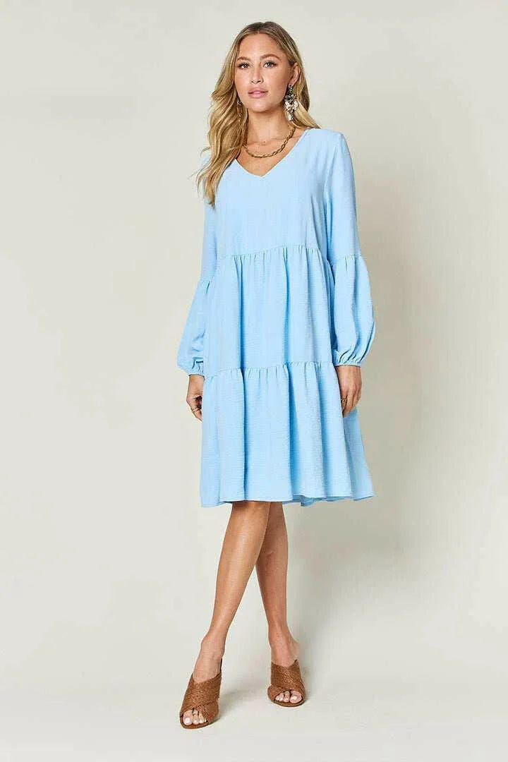 Effortless Elegance Tiered DressExclusivity statementDiscover the unmatched charm of the Effortless Elegance Tiered Dress, a chic mini dress designed exclusively for those who appreciate refined stMini DressesEffortless Elegance Tiered Dress