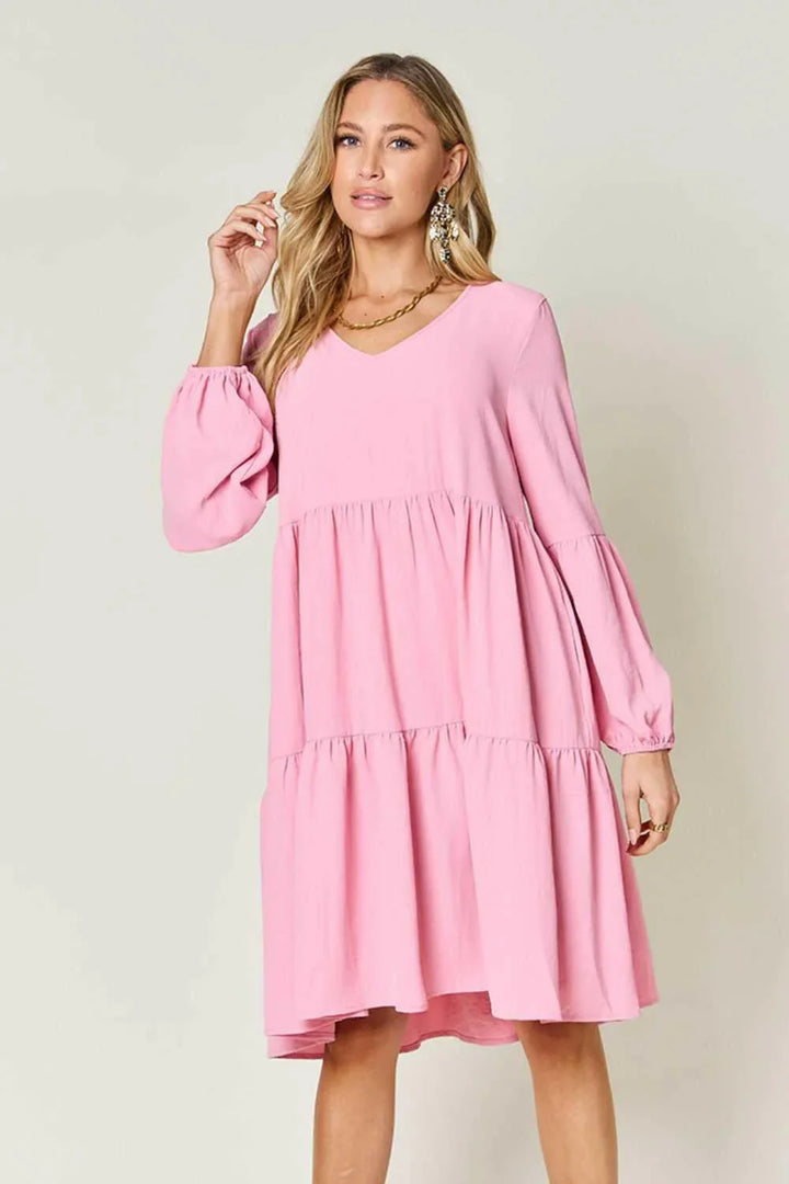 Effortless Elegance Tiered DressExclusivity statementDiscover the unmatched charm of the Effortless Elegance Tiered Dress, a chic mini dress designed exclusively for those who appreciate refined stMini DressesEffortless Elegance Tiered Dress