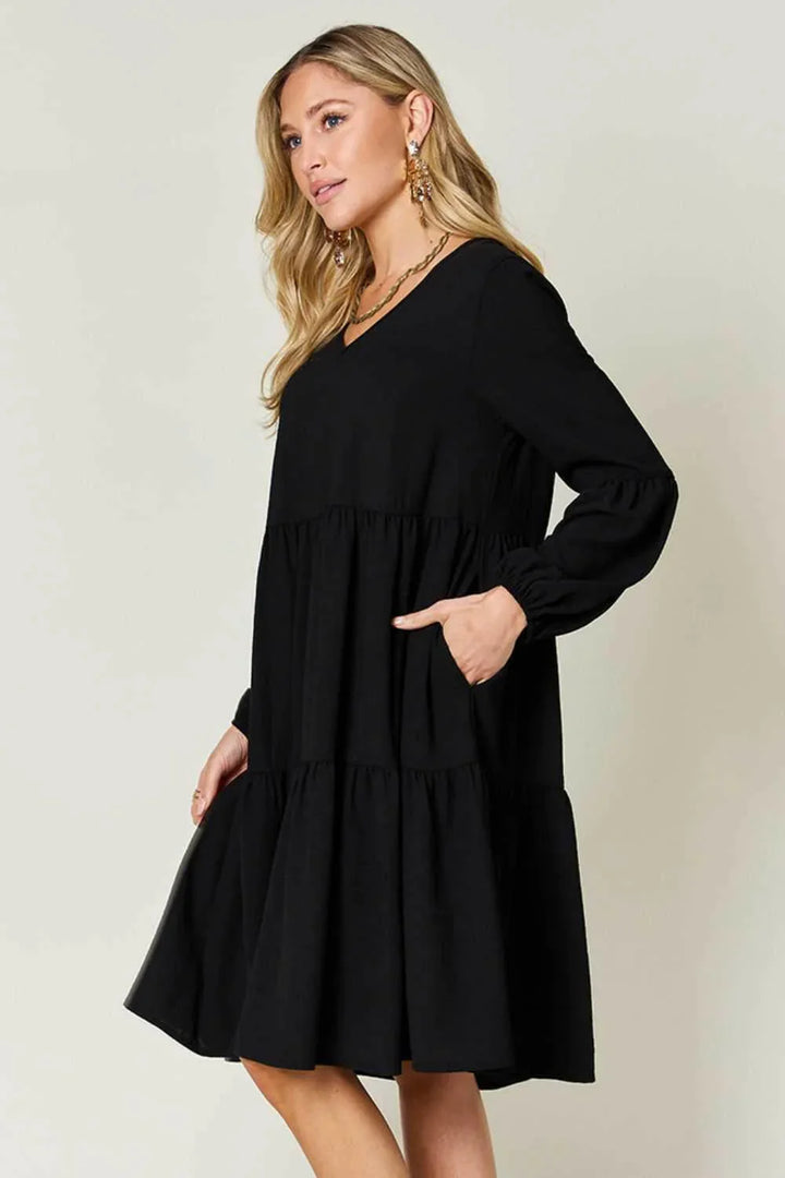 Effortless Elegance Tiered DressExclusivity statementDiscover the unmatched charm of the Effortless Elegance Tiered Dress, a chic mini dress designed exclusively for those who appreciate refined stMini DressesEffortless Elegance Tiered Dress