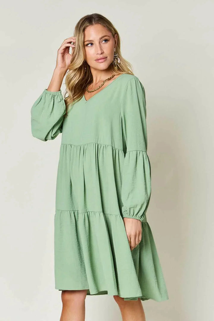 Effortless Elegance Tiered DressExclusivity statementDiscover the unmatched charm of the Effortless Elegance Tiered Dress, a chic mini dress designed exclusively for those who appreciate refined stMini DressesEffortless Elegance Tiered Dress