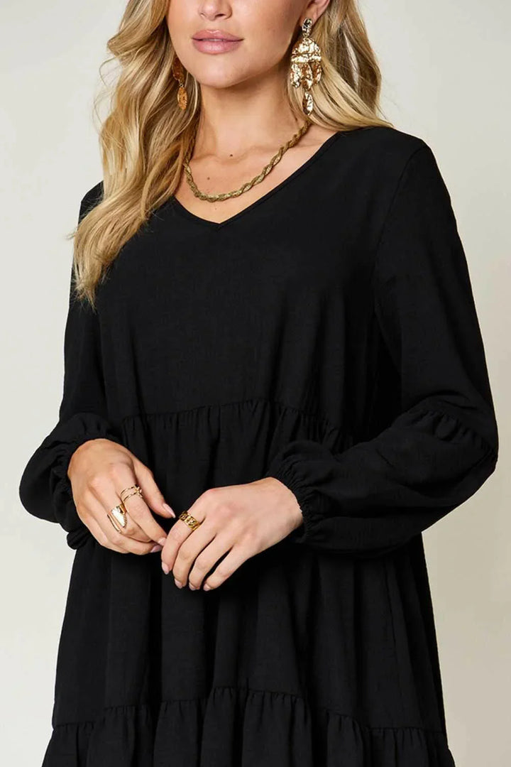 Effortless Elegance Tiered DressExclusivity statementDiscover the unmatched charm of the Effortless Elegance Tiered Dress, a chic mini dress designed exclusively for those who appreciate refined stMini DressesEffortless Elegance Tiered Dress