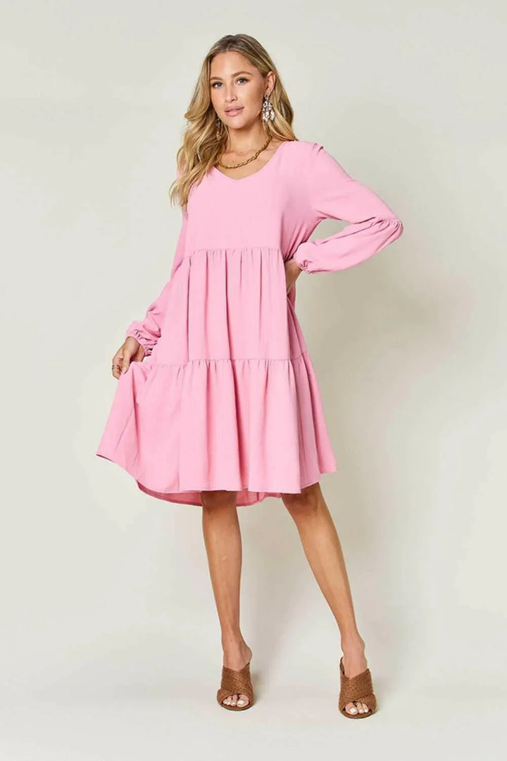 Effortless Elegance Tiered DressExclusivity statementDiscover the unmatched charm of the Effortless Elegance Tiered Dress, a chic mini dress designed exclusively for those who appreciate refined stMini DressesEffortless Elegance Tiered Dress