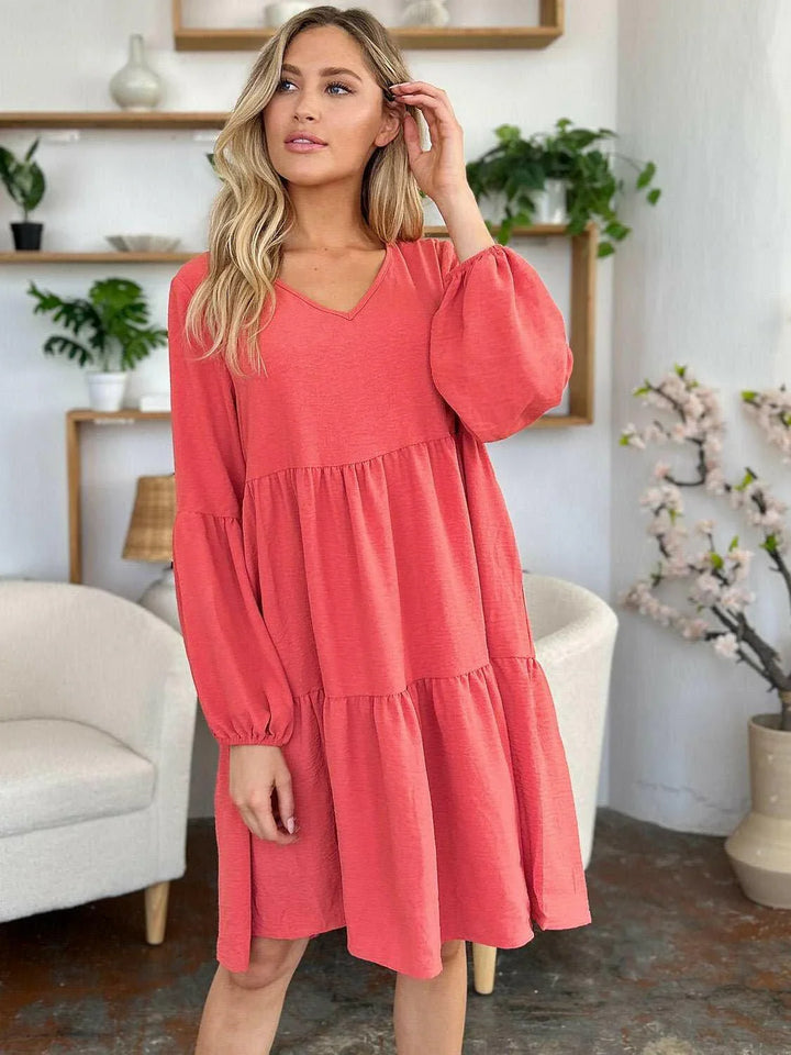 Effortless Elegance Tiered DressExclusivity statementDiscover the unmatched charm of the Effortless Elegance Tiered Dress, a chic mini dress designed exclusively for those who appreciate refined stMini DressesEffortless Elegance Tiered Dress