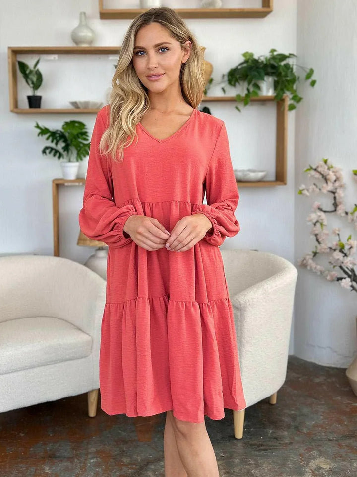 Effortless Elegance Tiered DressExclusivity statementDiscover the unmatched charm of the Effortless Elegance Tiered Dress, a chic mini dress designed exclusively for those who appreciate refined stMini DressesEffortless Elegance Tiered Dress