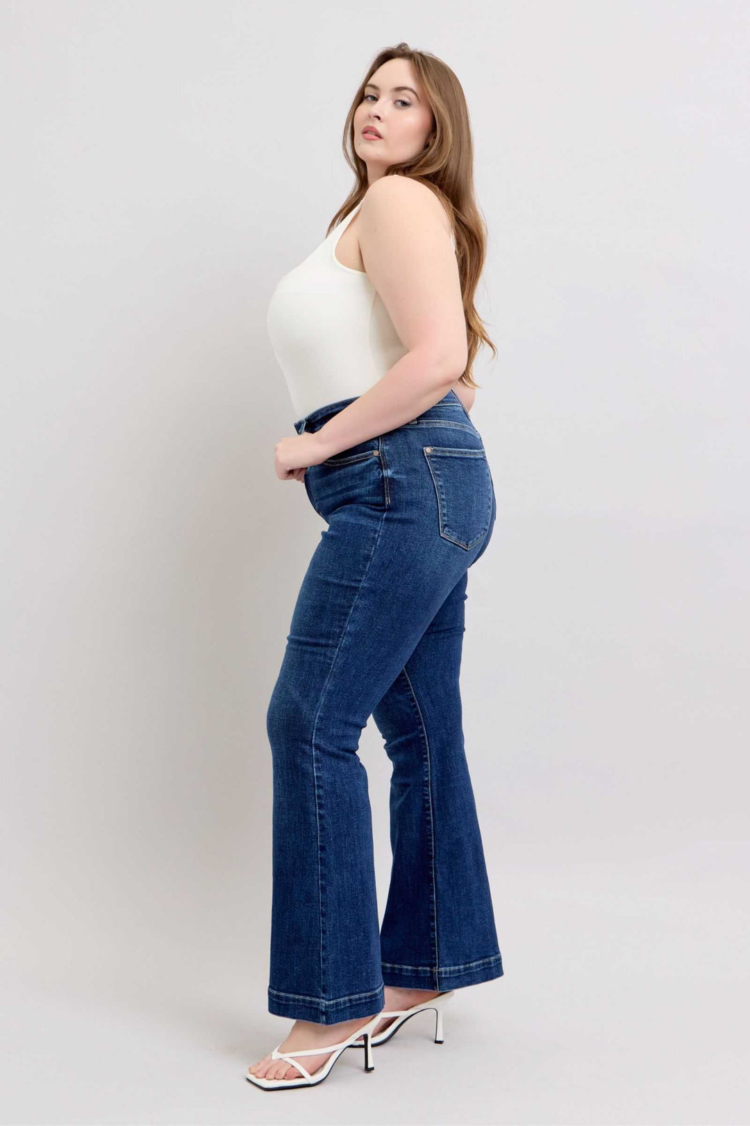 Judy Blue High Rise Flare Jeans with PocketsHigh-rise flare jeans with pockets are a trendy and versatile wardrobe staple. They provide a flattering high-waisted silhouette and the flare leg adds a chic retro Flare JeansJudy Blue High Rise Flare Jeans