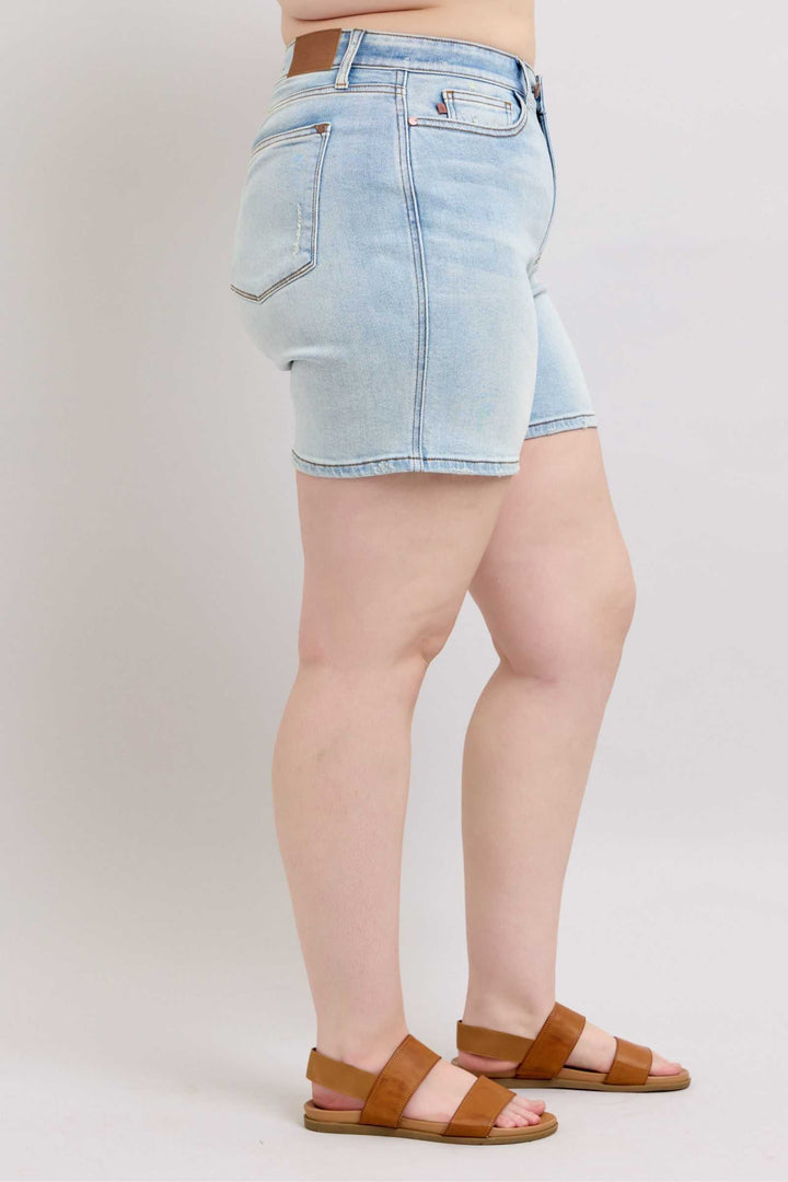 Judy Blue Two Button Denim ShortsThese 2-button denim shorts are a stylish addition to your wardrobe. They feature pockets for your convenience and added functionality. Made from durable denim fabriJean ShortsJudy Blue Two Button Denim Shorts