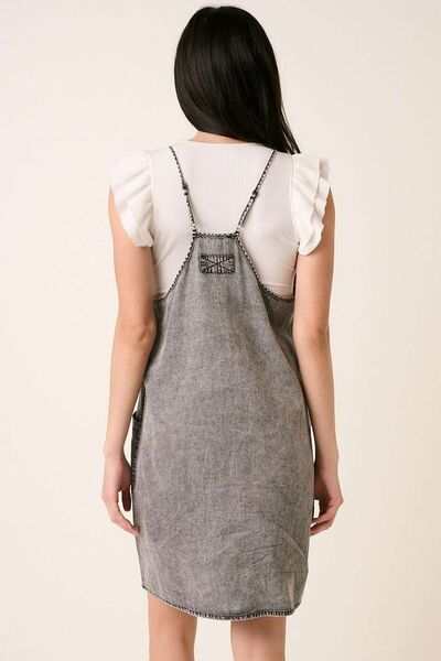 Washed Patch Pocket Mini Cami Denim DressThis washed patch pocket mini cami denim dress is a casual yet stylish addition to your wardrobe. The patch pockets add a touch of functionality and detail, while thMini DressesWashed Patch Pocket Mini Cami Denim Dress