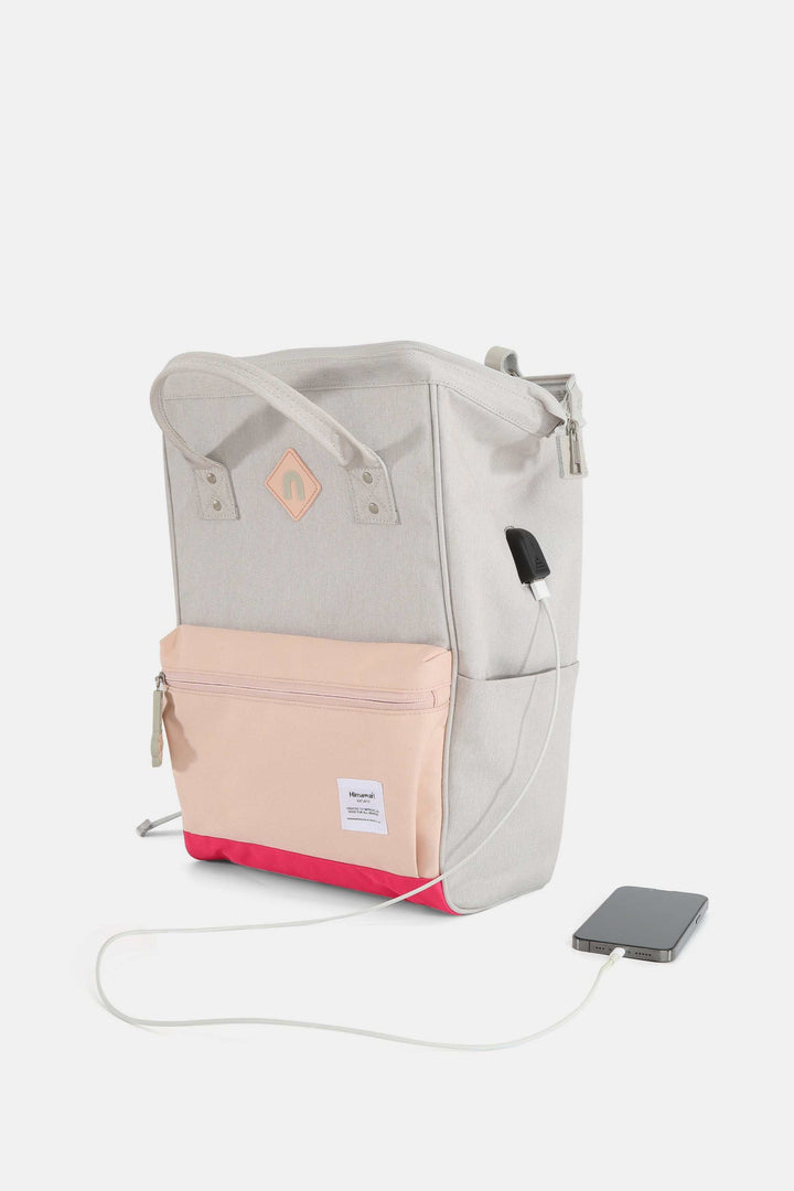 Himawari Contrast Waterproof Backpack Bag with External USB PortThe Waterproof Backpack Bag with External USB Port combines practicality with convenience for outdoor enthusiasts and travelers. Its waterproof material provides proBackpackHimawari Contrast Waterproof Backpack
