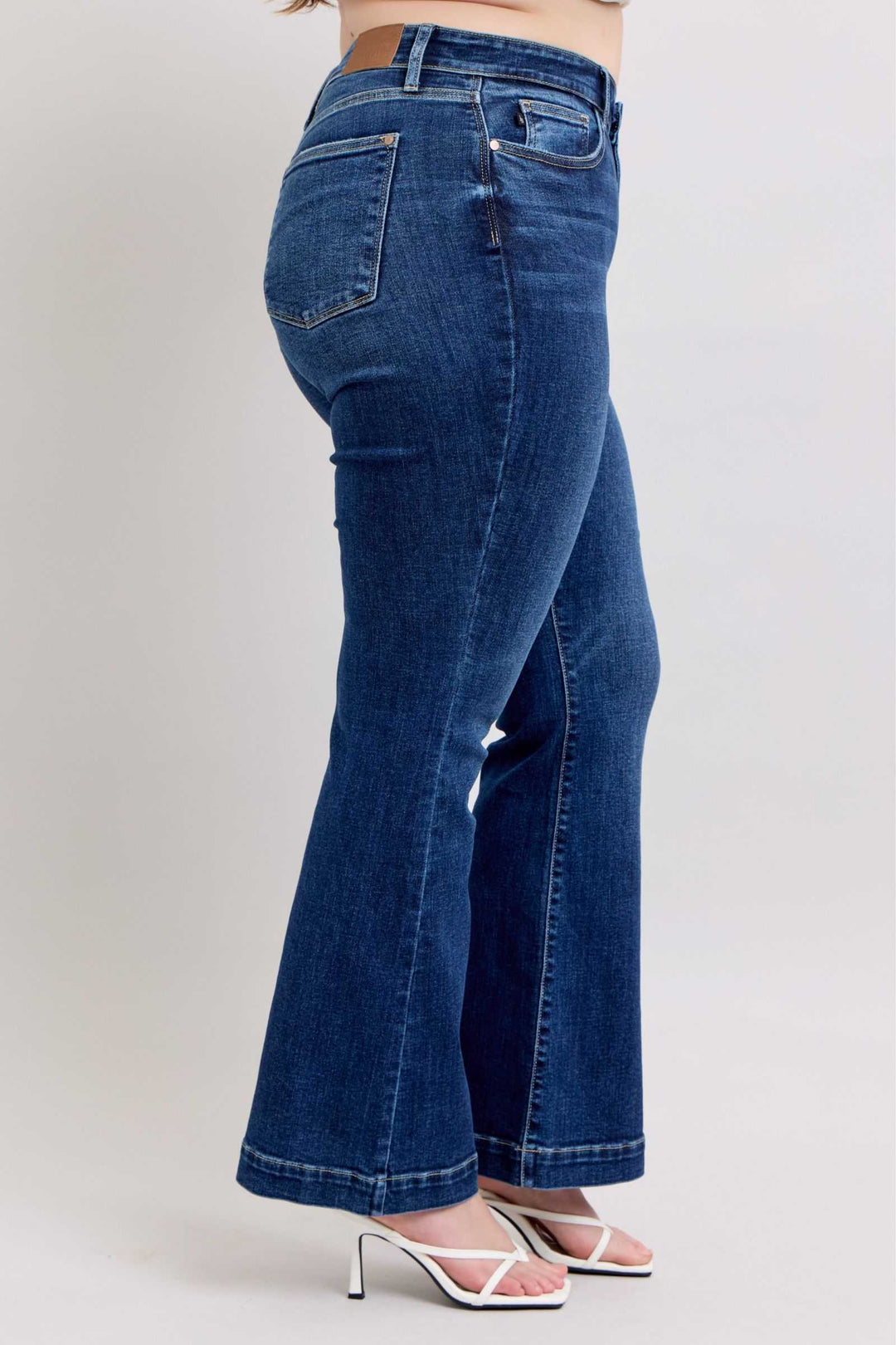 Judy Blue High Rise Flare Jeans with PocketsHigh-rise flare jeans with pockets are a trendy and versatile wardrobe staple. They provide a flattering high-waisted silhouette and the flare leg adds a chic retro Flare JeansJudy Blue High Rise Flare Jeans
