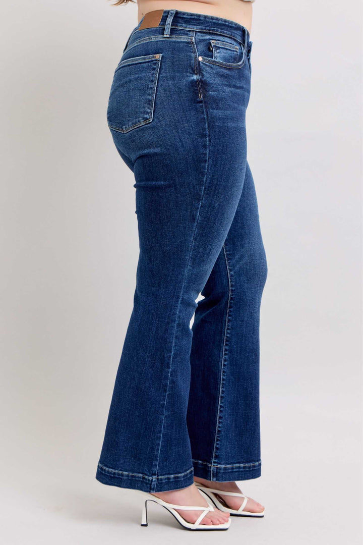 Judy Blue High Rise Flare Jeans with PocketsHigh-rise flare jeans with pockets are a trendy and versatile wardrobe staple. They provide a flattering high-waisted silhouette and the flare leg adds a chic retro Flare JeansJudy Blue High Rise Flare Jeans