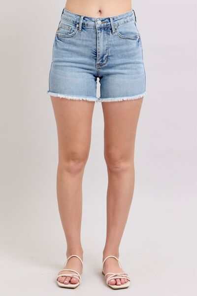 Judy Blue Tummy Control Raw Hem Denim ShortsThe tummy control raw hem denim shorts are designed to provide a slimming effect around the waist area while also featuring a trendy raw hem finish at the bottom. ThJean ShortsJudy Blue Tummy Control
