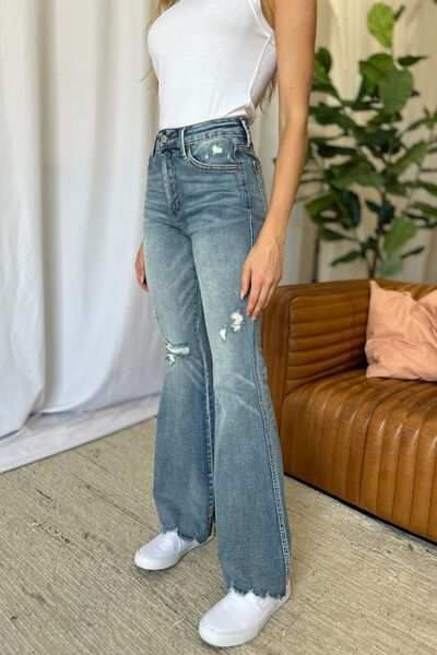 Judy Blue Medium Rise Tummy Control Destroyed FlareThe medium rise tummy control destroy flare jeans are designed to enhance your silhouette while providing ultimate comfort. Featuring a flattering fit, these jeans oFlare JeansJudy Blue Medium Rise