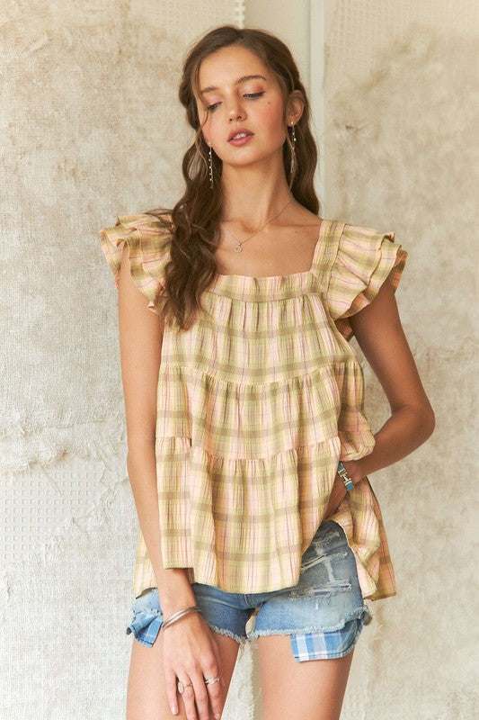 Sweet Prairie Ruffle TopLight as a summer breeze and full of vintage charm, the Sweet Prairie ruffle top brings effortless romance to any outfit. Crafted from soft, breathable cotton in a dShort Sleeve BlousesSweet Prairie Ruffle Top