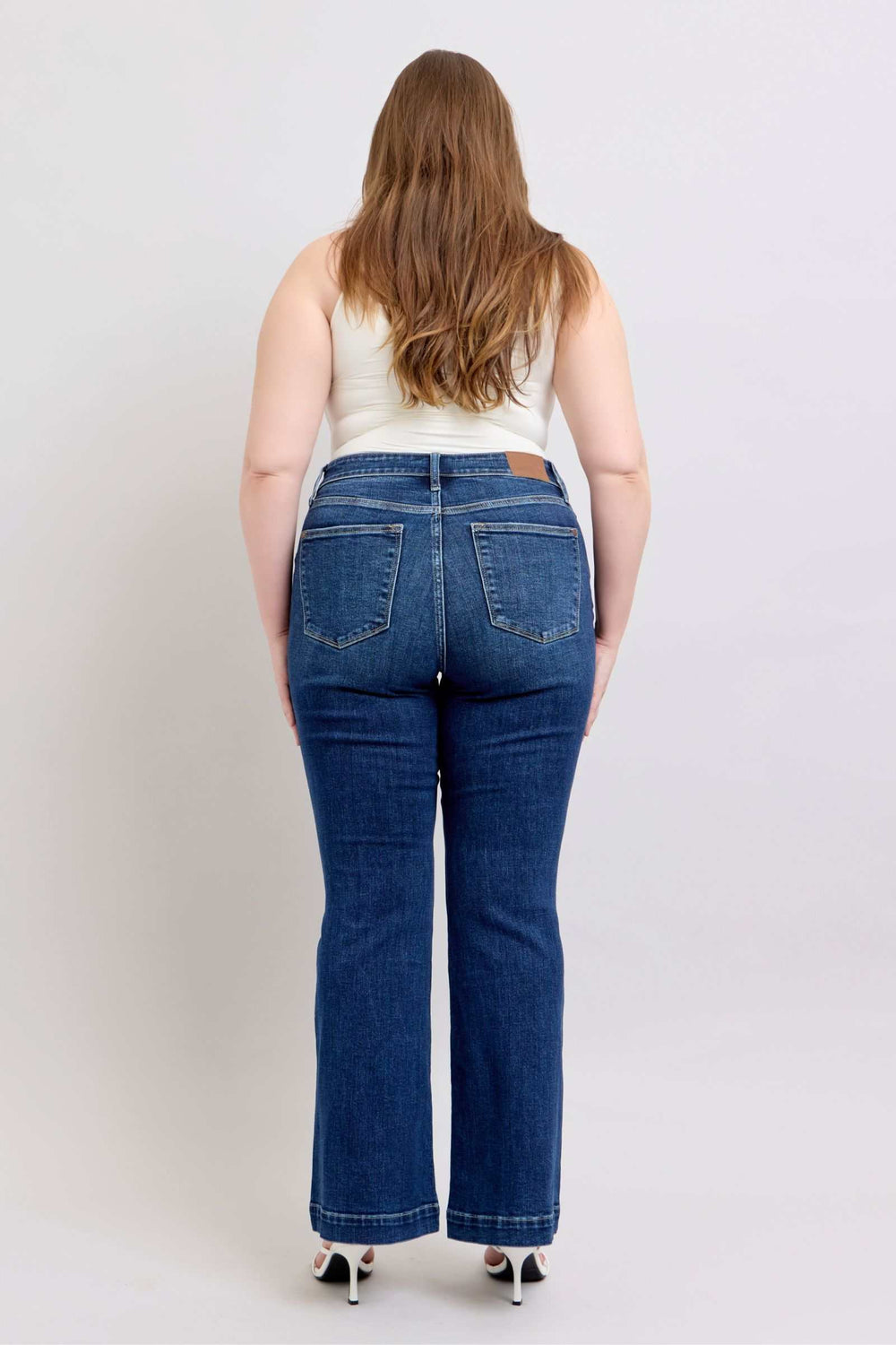 Judy Blue High Rise Flare Jeans with PocketsHigh-rise flare jeans with pockets are a trendy and versatile wardrobe staple. They provide a flattering high-waisted silhouette and the flare leg adds a chic retro Flare JeansJudy Blue High Rise Flare Jeans