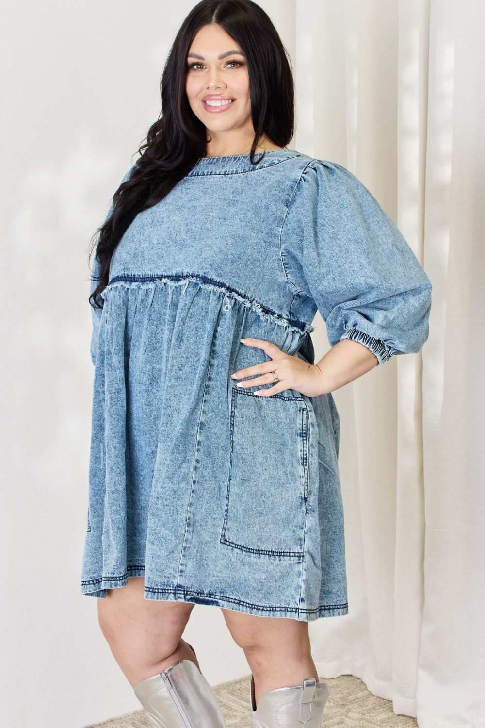 Oversized Denim Babydoll DressThis dress boasts a relaxed, oversized fit that flatters all body types. The babydoll silhouette adds a touch of playful femininity, while the balloon sleeves exude Mini DressesOversized Denim Babydoll Dress