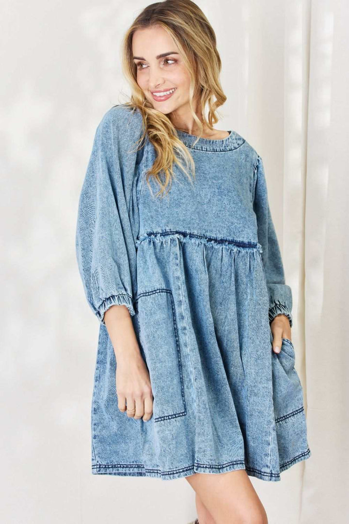 Oversized Denim Babydoll DressThis dress boasts a relaxed, oversized fit that flatters all body types. The babydoll silhouette adds a touch of playful femininity, while the balloon sleeves exude Mini DressesOversized Denim Babydoll Dress