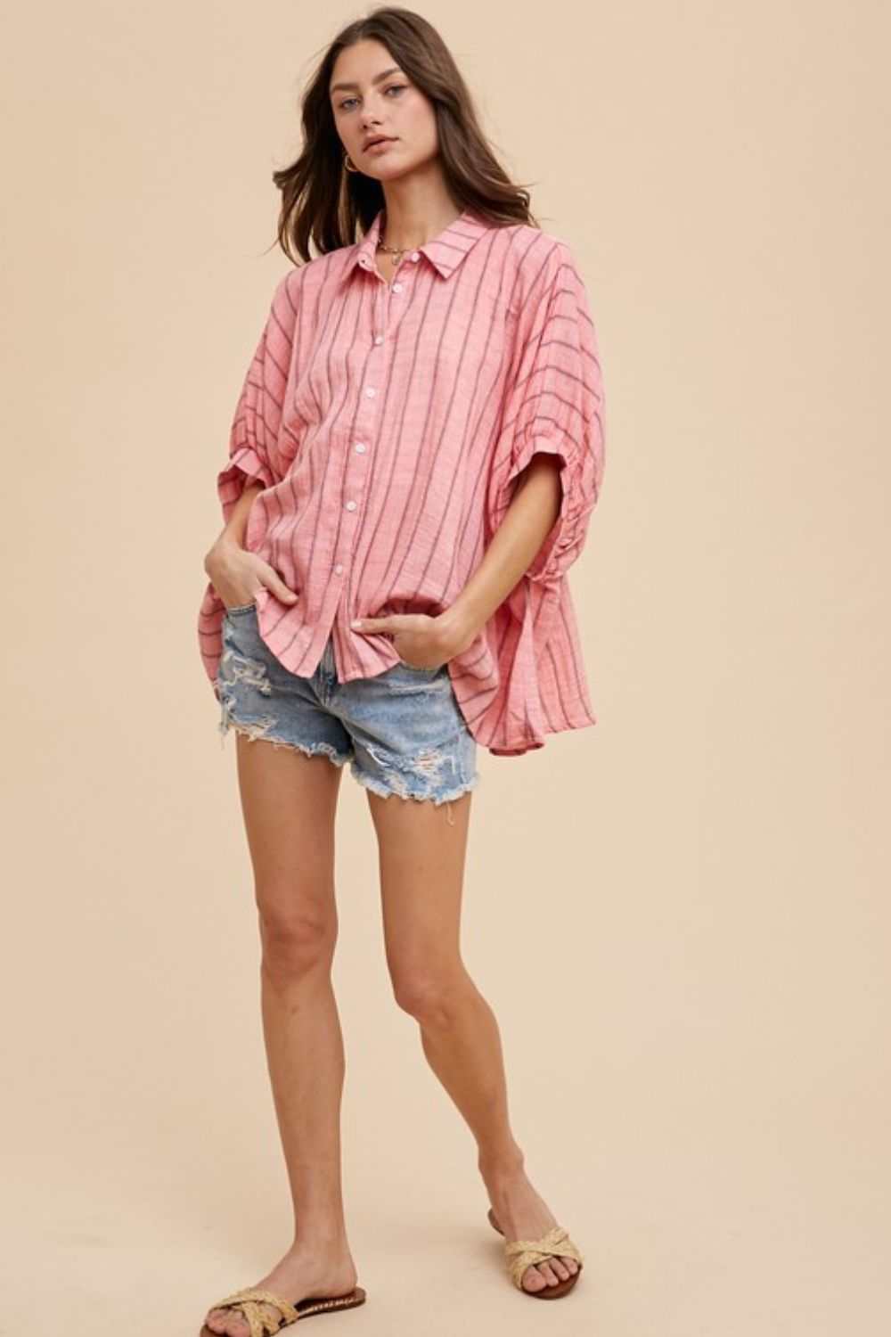 Desert Rose Oversized ShirtThe Desert Rose shirt is an airy, free-spirited take on classic shirting. Crafted from lightweight cotton with soft, sun-washed stripes, this oversized button-up bleButton-Up ShirtsDesert Rose