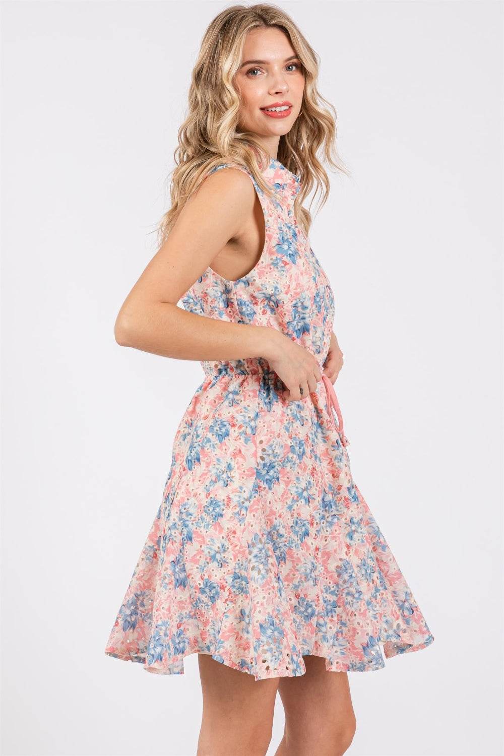 Floral Eyelet Sleeveless Mini DressThe Floral Eyelet Sleeveless Mini Dress is a charming and feminine choice for warm-weather occasions. Featuring delicate floral eyelet detailing, this dress exudes aMini DressesFloral Eyelet Sleeveless