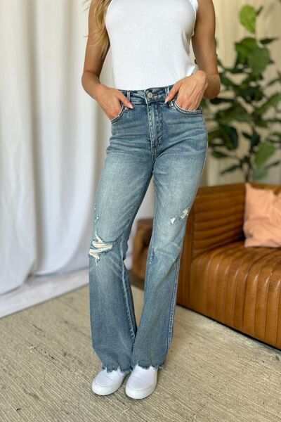 Judy Blue Medium Rise Tummy Control Destroyed FlareThe medium rise tummy control destroy flare jeans are designed to enhance your silhouette while providing ultimate comfort. Featuring a flattering fit, these jeans oFlare JeansJudy Blue Medium Rise