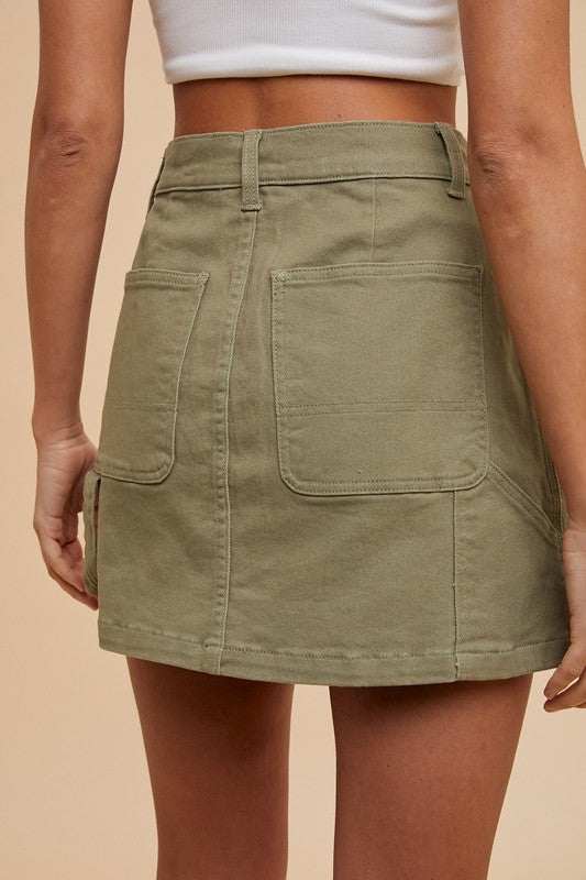 Cargo Denim Mini SkirtA cargo denim mini skirt combines the edgy style of cargo pants with the classic silhouette of a mini skirt, creating a trendy and versatile piece. The cargo pocketsMini SkirtsCargo Denim Mini Skirt