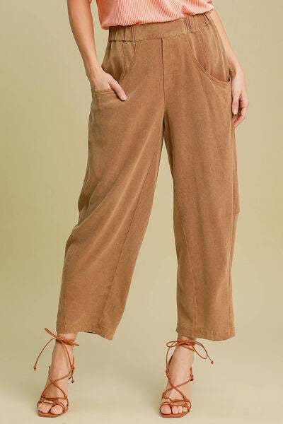 The Sandbar Linen Blend TrousersEasy, breathable, and softly structured — The [NAME] Trousers are crafted from a natural linen-cotton blend that moves effortlessly through warm days and cooler evenPantsThe Sandbar Linen Blend Trousers