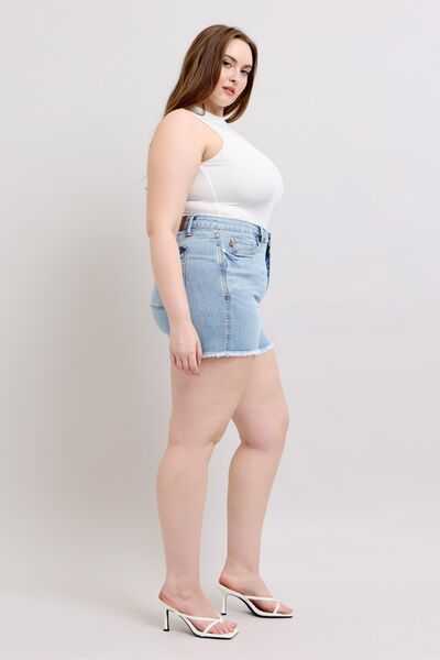 Judy Blue Tummy Control Raw Hem Denim ShortsThe tummy control raw hem denim shorts are designed to provide a slimming effect around the waist area while also featuring a trendy raw hem finish at the bottom. ThJean ShortsJudy Blue Tummy Control