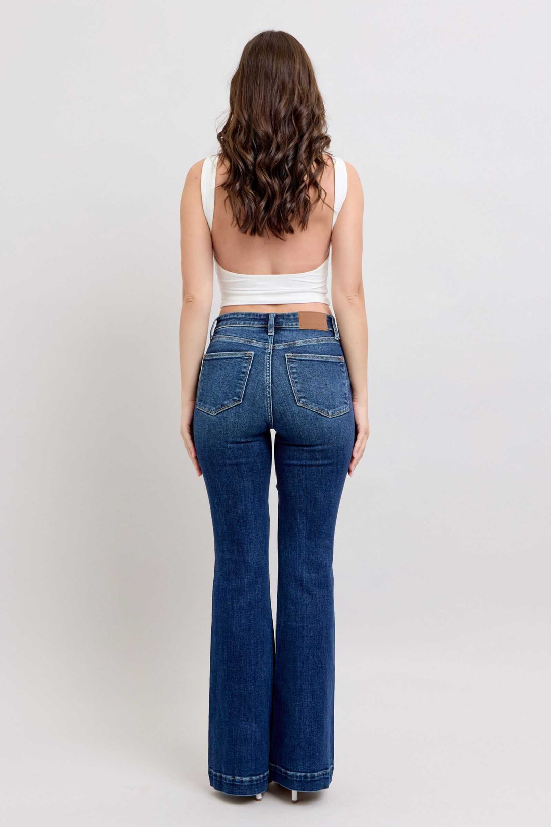 Judy Blue High Rise Flare Jeans with PocketsHigh-rise flare jeans with pockets are a trendy and versatile wardrobe staple. They provide a flattering high-waisted silhouette and the flare leg adds a chic retro Flare JeansJudy Blue High Rise Flare Jeans