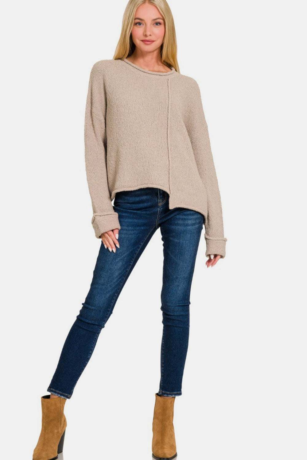 Asymmetric Hem Drop Shoulder SweaterThe Asymmetric Hem Drop Shoulder Sweater is a trendy and modern piece that offers a unique silhouette. With its drop shoulder design, this sweater exudes a relaxed aSweatersAsymmetric Hem Drop Shoulder Sweater