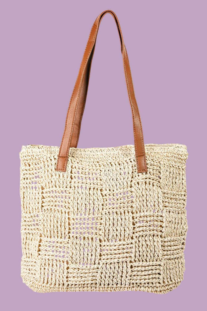 Braided Tote BagThis versatile tote bag features a stylish braided faux leather strap that adds texture and flair to the classic design. Made from top-quality materials, this durablTote BagsBraided Tote Bag