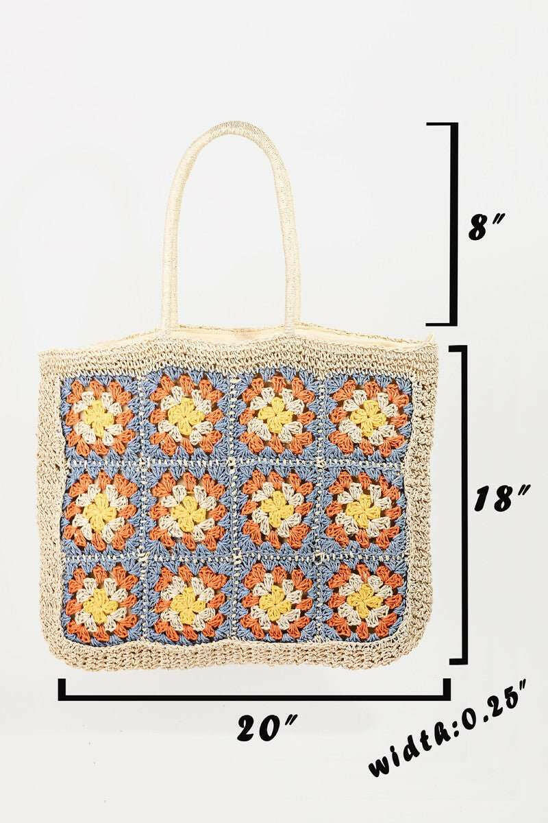 Granny Square Tote BagThe Granny Square Tote Bag is a delightful and stylish accessory that adds a touch of bohemian flair to any outfit. Its intricate braided detailing and floral embellTote BagsGranny Square Tote Bag
