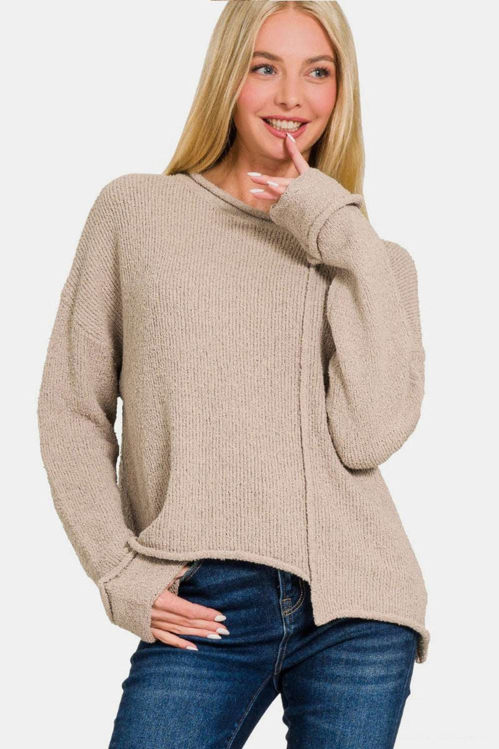 Asymmetric Hem Drop Shoulder SweaterThe Asymmetric Hem Drop Shoulder Sweater is a trendy and modern piece that offers a unique silhouette. With its drop shoulder design, this sweater exudes a relaxed aSweatersAsymmetric Hem Drop Shoulder Sweater