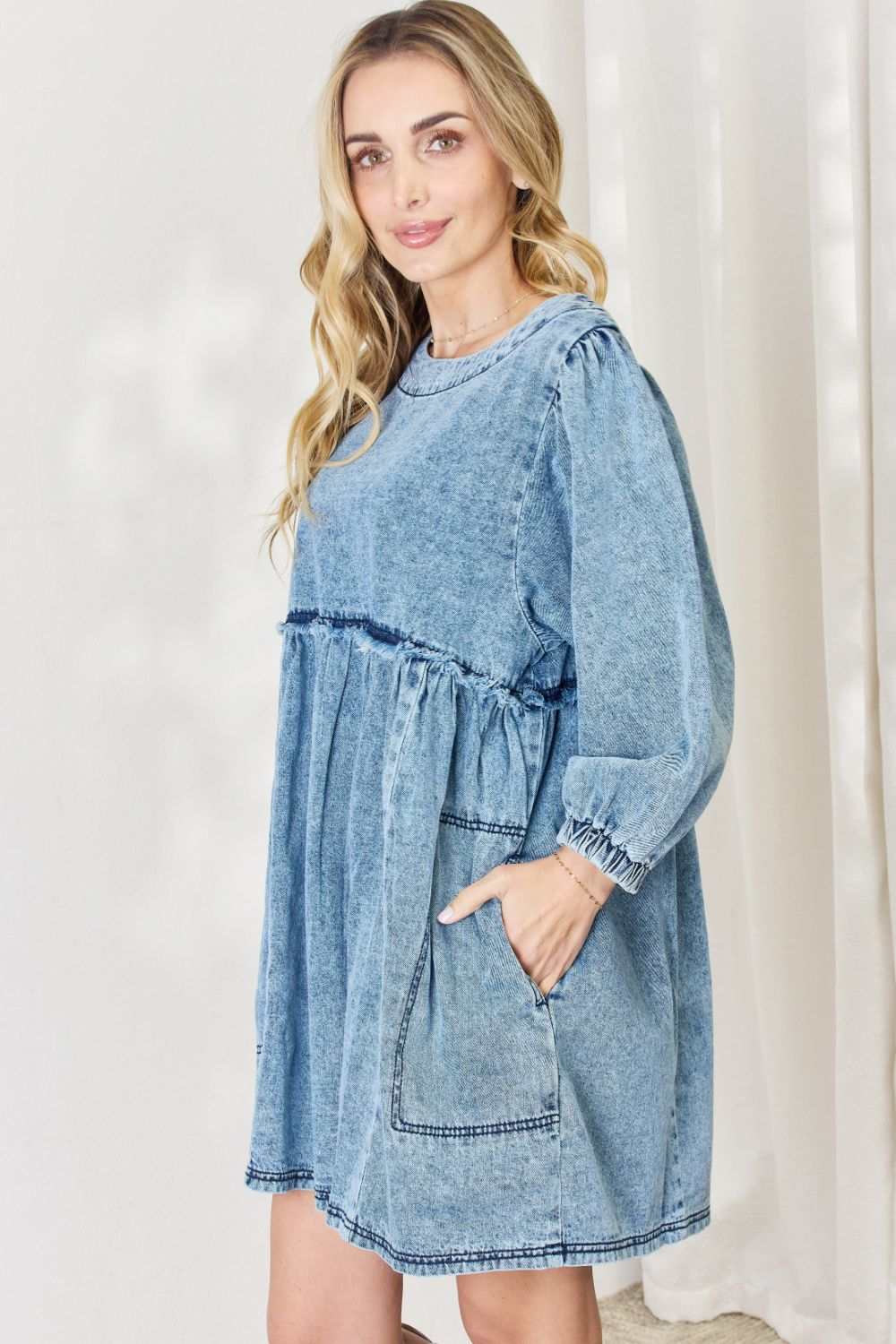 Oversized Denim Babydoll DressThis dress boasts a relaxed, oversized fit that flatters all body types. The babydoll silhouette adds a touch of playful femininity, while the balloon sleeves exude Mini DressesOversized Denim Babydoll Dress