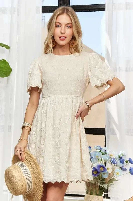 ADORA Rround Neck Crinkle Babydoll DressThe round neck crinkle babydoll dress is a charming and feminine option for any day. Its relaxed silhouette and crinkled texture add a playful touch to your outfit. ADORA Rround Neck