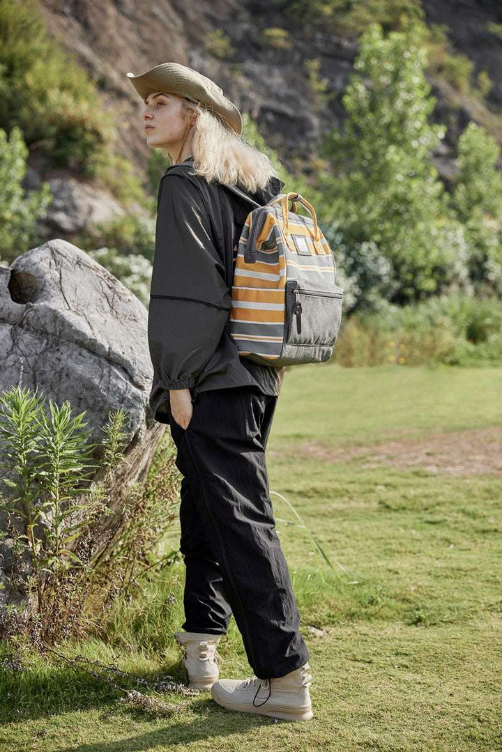 Himawari Striped Waterproof Nylon Backpack Bag with Side PocketsThe Striped Waterproof Nylon Backpack Bag with Side Pockets is a fashionable and functional accessory for any outing. Its stylish striped design adds a touch of flaiBackpackHimawari Striped Waterproof Nylon Backpack