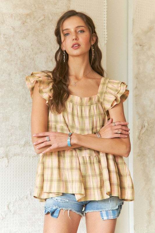 Sweet Prairie Ruffle TopLight as a summer breeze and full of vintage charm, the Sweet Prairie ruffle top brings effortless romance to any outfit. Crafted from soft, breathable cotton in a dShort Sleeve BlousesSweet Prairie Ruffle Top