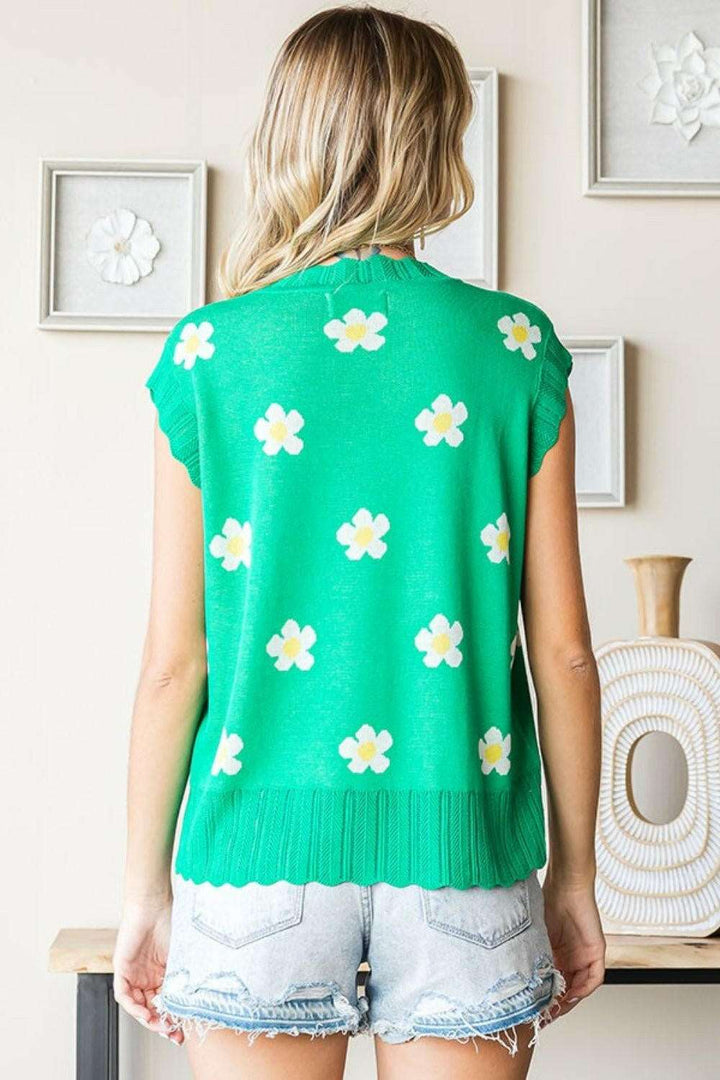 Flower Pattern Round Neck Sweater VestThe Flower Pattern Round Neck Sweater Vest is a delightful addition to your wardrobe. With its charming flower design and classic round neckline, this sweater vest eSweatersFlower Pattern Round Neck