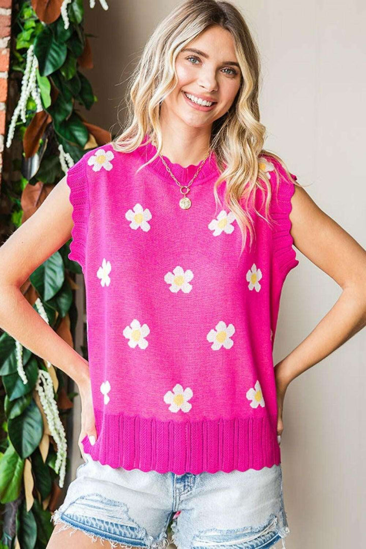 Flower Pattern Round Neck Sweater VestThe Flower Pattern Round Neck Sweater Vest is a delightful addition to your wardrobe. With its charming flower design and classic round neckline, this sweater vest eSweatersFlower Pattern Round Neck