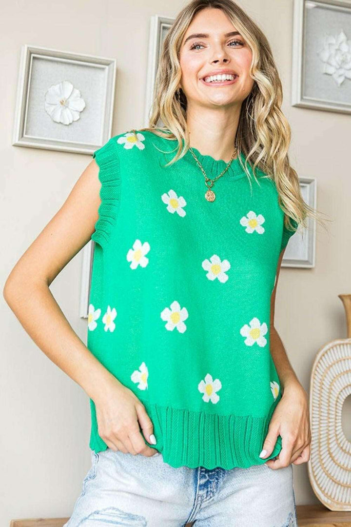 Flower Pattern Round Neck Sweater VestThe Flower Pattern Round Neck Sweater Vest is a delightful addition to your wardrobe. With its charming flower design and classic round neckline, this sweater vest eSweatersFlower Pattern Round Neck