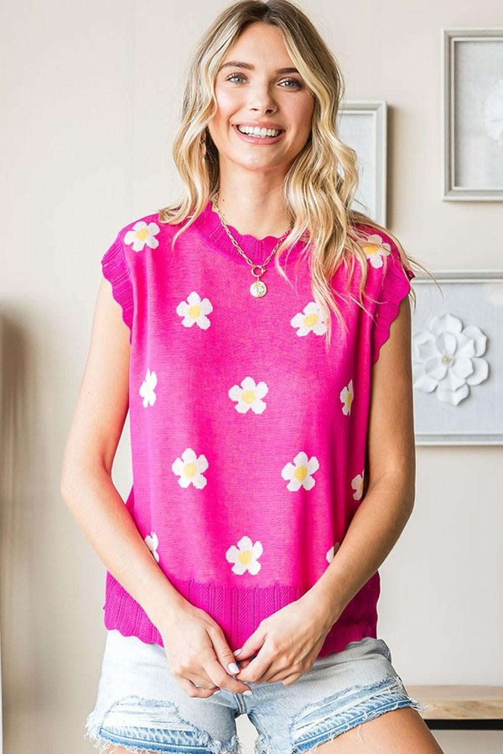 Flower Pattern Round Neck Sweater VestThe Flower Pattern Round Neck Sweater Vest is a delightful addition to your wardrobe. With its charming flower design and classic round neckline, this sweater vest eSweatersFlower Pattern Round Neck