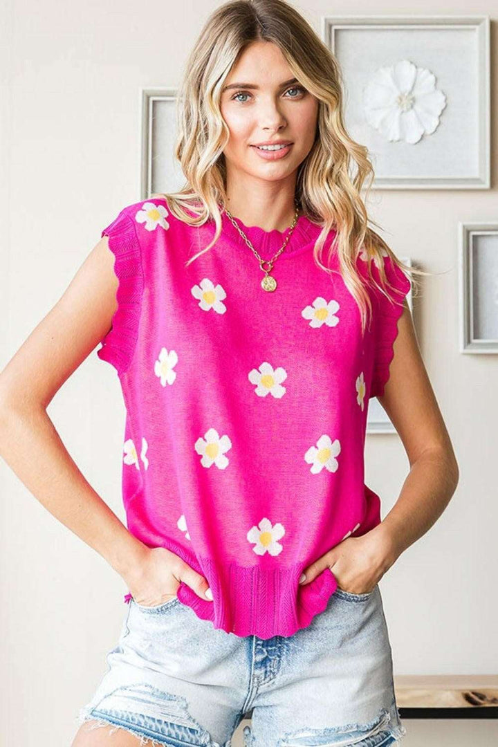 Flower Pattern Round Neck Sweater VestThe Flower Pattern Round Neck Sweater Vest is a delightful addition to your wardrobe. With its charming flower design and classic round neckline, this sweater vest eSweatersFlower Pattern Round Neck