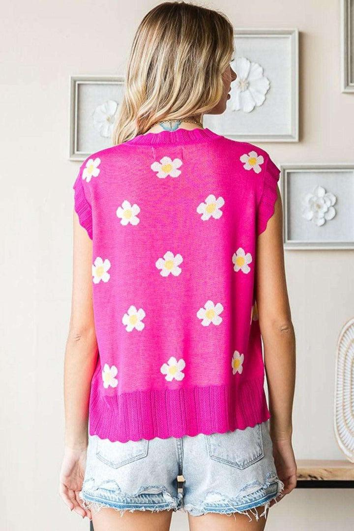 Flower Pattern Round Neck Sweater VestThe Flower Pattern Round Neck Sweater Vest is a delightful addition to your wardrobe. With its charming flower design and classic round neckline, this sweater vest eSweatersFlower Pattern Round Neck