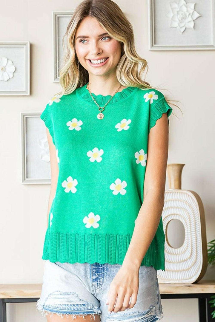 Flower Pattern Round Neck Sweater VestThe Flower Pattern Round Neck Sweater Vest is a delightful addition to your wardrobe. With its charming flower design and classic round neckline, this sweater vest eSweatersFlower Pattern Round Neck