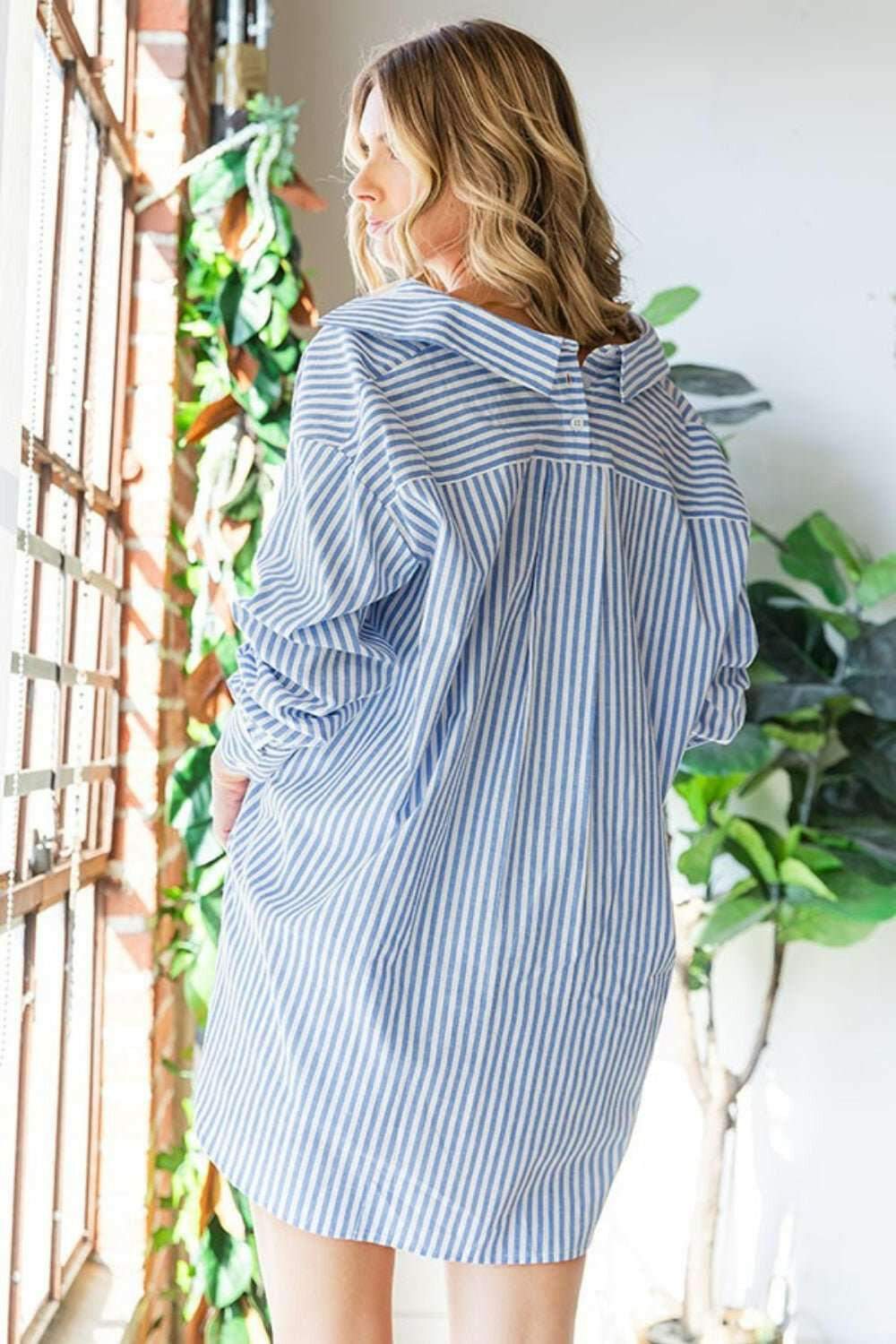 Striped Oversized Button Down ShirtThis 100% cotton Striped Oversized Button Down Shirt is a versatile and stylish piece that will elevate your wardrobe. The classic striped pattern adds a timeless toButton-Up ShirtsStriped Oversized Button
