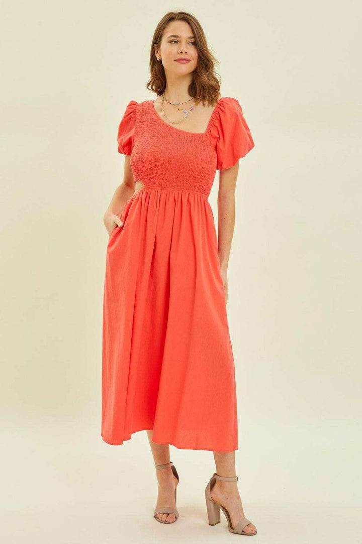 Cherry Red Smocked Midi DressAdd a playful and fashionable touch to your wardrobe with the Smocked Cutout Midi Dress. Featuring a smocked bodice and trendy cutouts, this dress is perfect for anyMidi DressesCherry Red Smocked Midi Dress