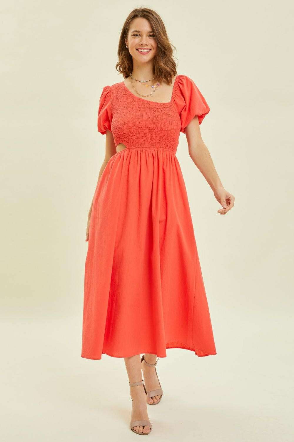 Cherry Red Smocked Midi DressAdd a playful and fashionable touch to your wardrobe with the Smocked Cutout Midi Dress. Featuring a smocked bodice and trendy cutouts, this dress is perfect for anyMidi DressesCherry Red Smocked Midi Dress