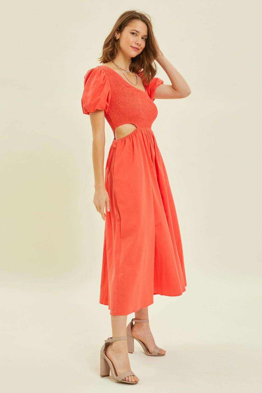 Cherry Red Smocked Midi DressAdd a playful and fashionable touch to your wardrobe with the Smocked Cutout Midi Dress. Featuring a smocked bodice and trendy cutouts, this dress is perfect for anyMidi DressesCherry Red Smocked Midi Dress